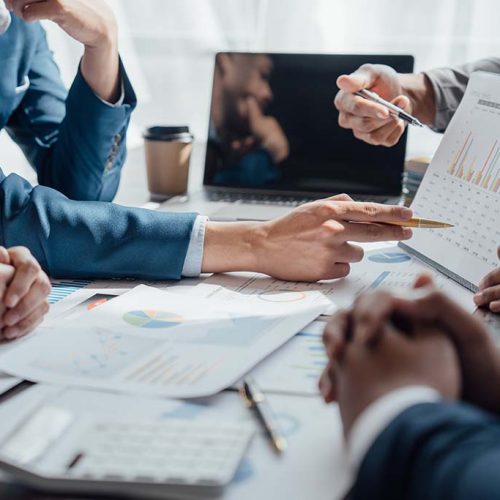 Accounting fund managers meeting to planning to improve quality next year team consultation investment stock market analysis and checking document, investigation of corruption account. anti bribery